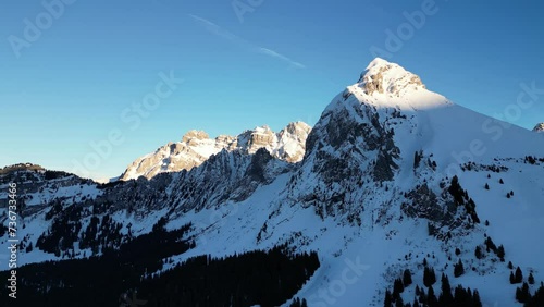 Fronalpstock Switzerland Glarus Swiss alps blue sky mountain range reverse flight photo