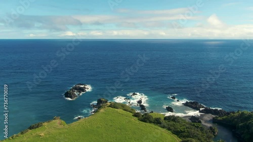 Pacific ocean horizon and Hawaii island with Waioka pond area, aerial view photo