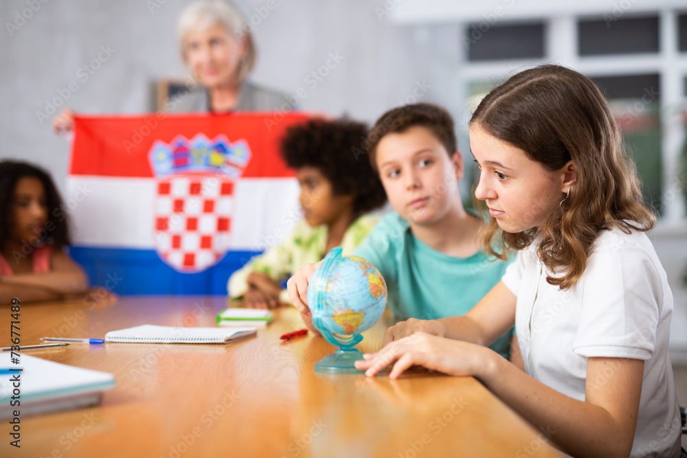 Fototapeta premium Kids learning together about croatia in geography class