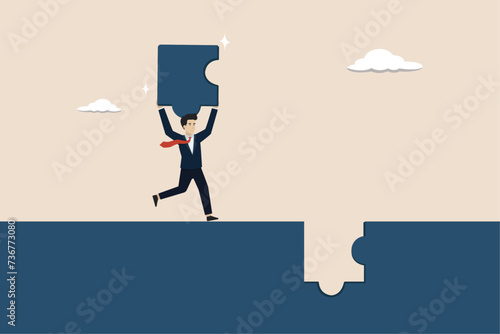 Complete jigsaw puzzle to solve business problem, challenge and accomplishment concept, businessman complete last missing jigsaw puzzle piece.