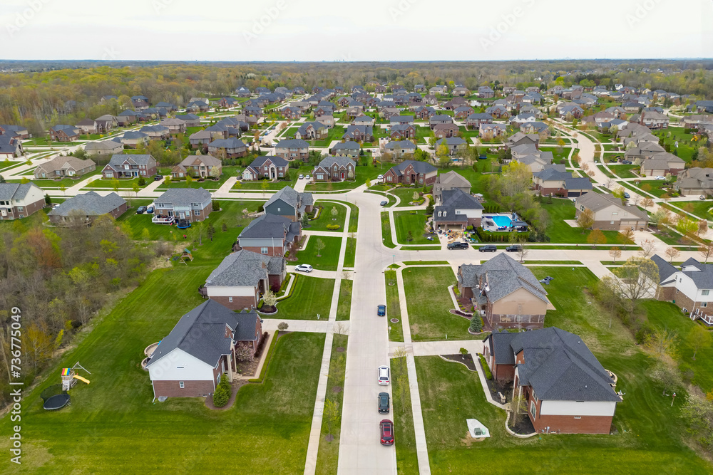 Fototapeta premium Aerial top down view of houses in a neighborhood, Michigan