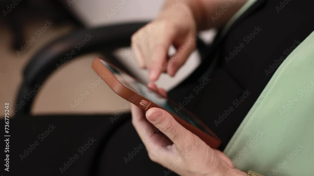 person typing on a smartphone, hand using a smartphone 