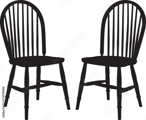 Two black wooden chairs with spindle backrests