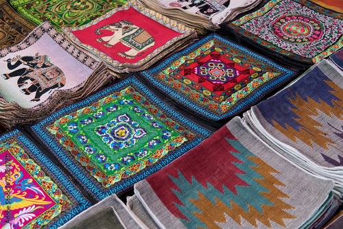 View of the colored carpets displayed in the market of Luang Prabang, Laos