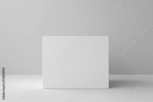 Blank white box mock up on a clean and minimalistic background photo