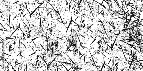 Grunge is black and white. Monochrome abstract background. Old worn surface. Destroyed crumbled plaster on aged painted brushed surface. Dark noise granules.