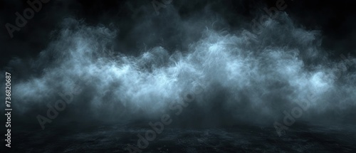 a black and white photo of a dark room with a lot of smoke coming out of the back of the room.