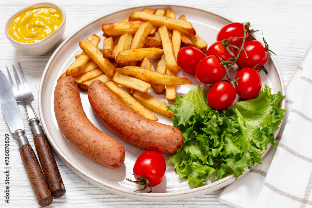 sausages with potato, lettuce, tomatoes, top view sausages with potato, lettuce, tomatoes, top view