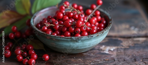 Fresh cornus berries in the bowl  ripe and juicy.