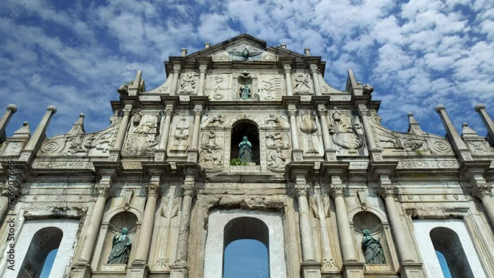 Ruin of St.Paul cathedral time lapse on a sunny day, the travel destination landmark of Macau, China. Ruin of St.Paul cathedral time lapse on a sunny day, the travel destination landmark of Macau, China.