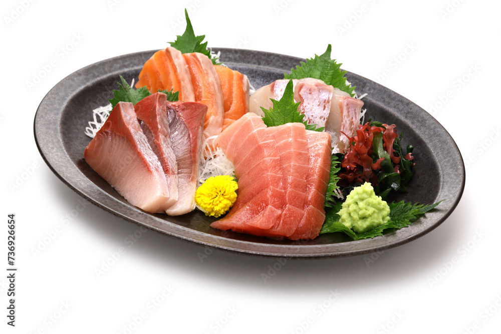 assorted sashimi; tuna(medium fatty), salmon, yellowtail, and sea bream. authentic Japanese dining isolated on white background. assorted sashimi; tuna(medium fatty), salmon, yellowtail, and sea bream. authentic Japanese dining isolated on white background.