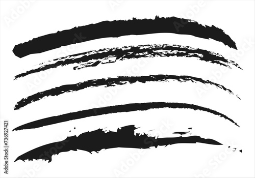 Trazos de pincelada negra en fondo blanco.