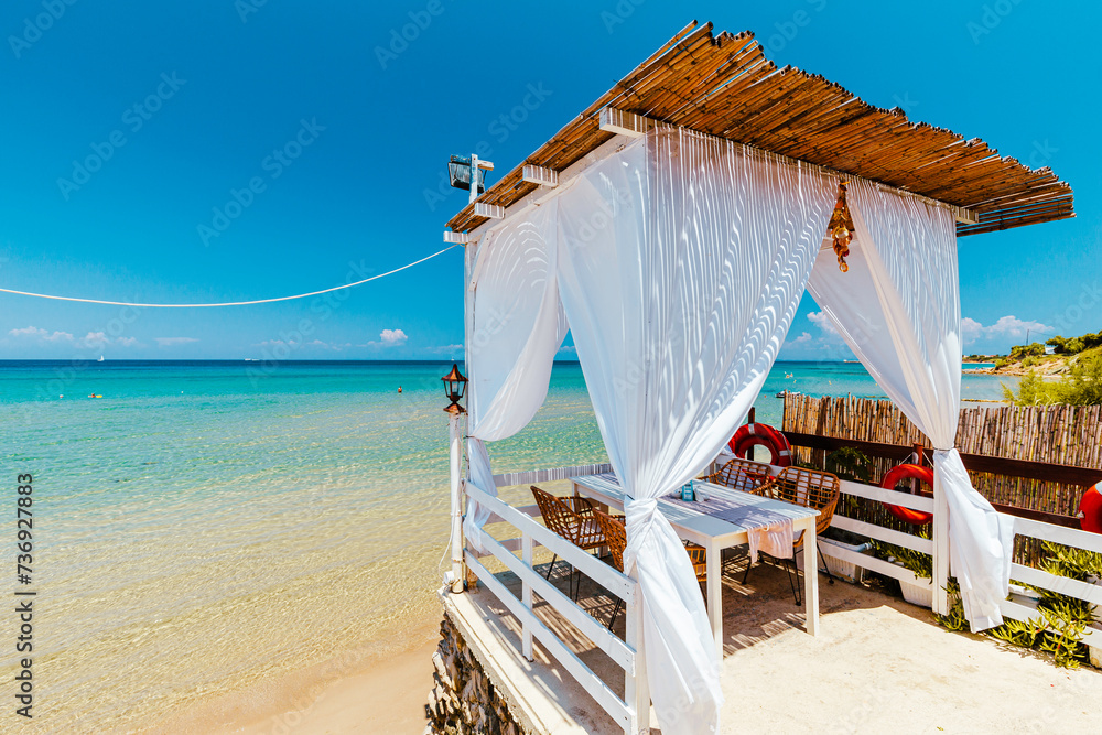 Paradise restaurant on tropical seashore. Zakhyntos, Greece.