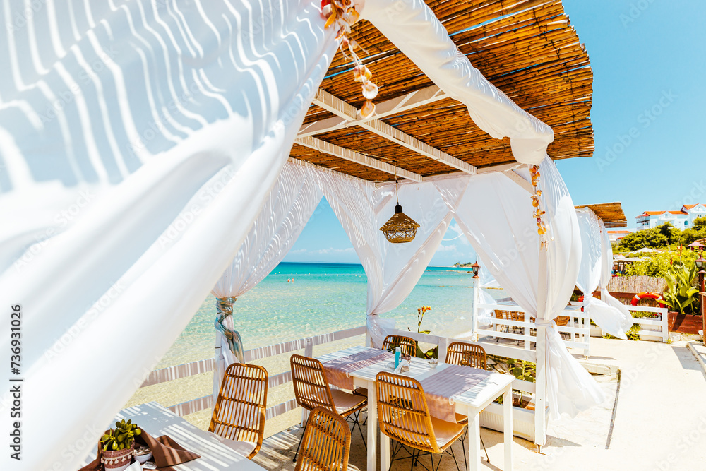 Paradise restaurant on tropical seashore. Zakhyntos, Greece.