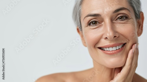 Happy smiling adult 28s aged woman looking at camera portrait isolated on white background. Hair and skin beauty care products advertising concept. copy space.