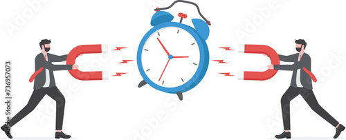 Time management, control business time or work deadline concept, smart businessman using magnet to stop clock hand metaphor of time manipulation.
