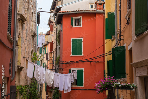A quiet back street in the historic centre of the medieval coastal town of Rovinj in Istria, Croatia #736960647