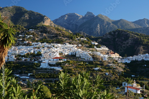 General view of the village Frigiliana, Axarquia, Malaga province, Andalusia, Spain, with surrounding mountains (National Park Sierra de Tejada, Almijara y Alhama)  and with whitewashed houses © Christophe Cappelli