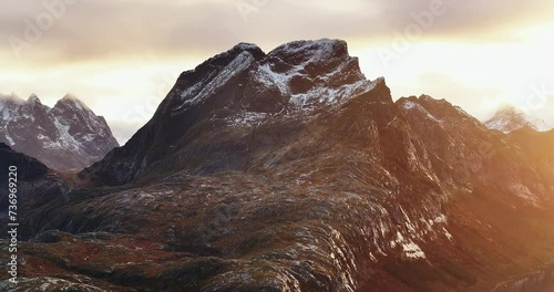 Sunset Embrace: The Lofoten Giants' Golden Hour