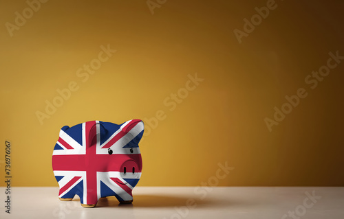 Piggy bank with painting of United Kingdom flag. The problem is in the economy. Economic crisis. Saving money concept.