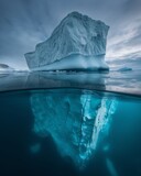 Surreal Iceberg Reflection in the Arctic Twilight