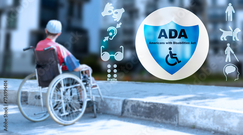 ADA Americans with Disabilities Act. Disabled man in a wheelchair in the city. photo