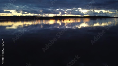 Sant'Antioco establishing aerial view of Lagoon at sunset, Flamingo wildlife photo