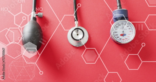 Image of chemical structures over stethoscope and pressure meter