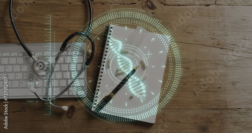 Image of dna strand and scope scanning over keyboard and stethoscope