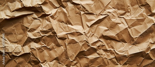 Recycled brown craft paper and crumpled cardboard background.