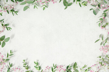 Frame made of spring flowers, flat lay