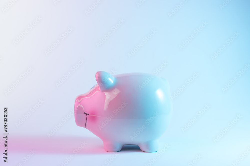 Piggy bank in vibrant bold gradient holographic colors. Christmas and New Year minimal art concept. Piggy bank in vibrant bold gradient holographic colors. Christmas and New Year minimal art concept.