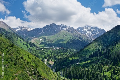 Beautiful spring landscape in the mountains of Almaty on cloudy sky