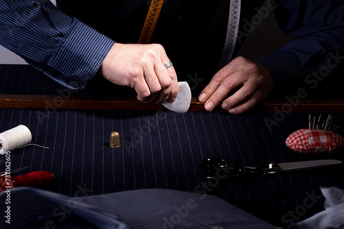 view of a tailored suit from a tailor in his studio
