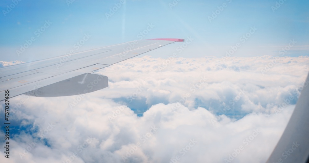 Airplane wing clouds, clear day flight, window view. showcasing aviation technology. skies, advanced technology harmony, flight technological marvel. Technology tranquil, pristine atmosphere. Airplane wing clouds, clear day flight, window view. showcasing aviation technology. skies, advanced technology harmony, flight technological marvel. Technology tranquil, pristine atmosphere.