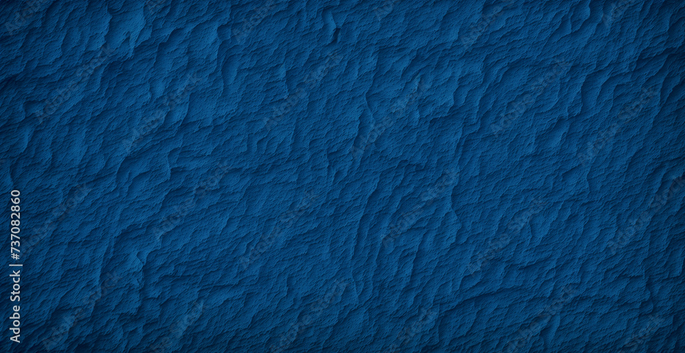 A blue wall with a rough texture is shown in this image A blue wall with a rough texture is shown in this image