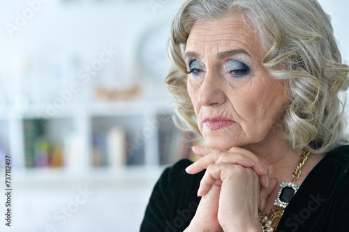 Close up portrait of sad senior woman