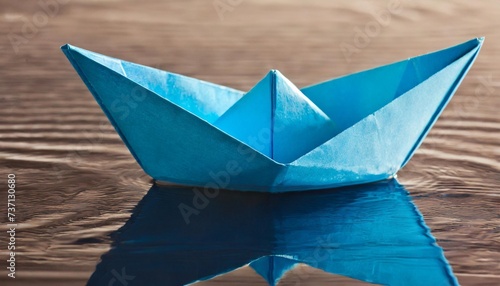 blue paper boat © Marsha
