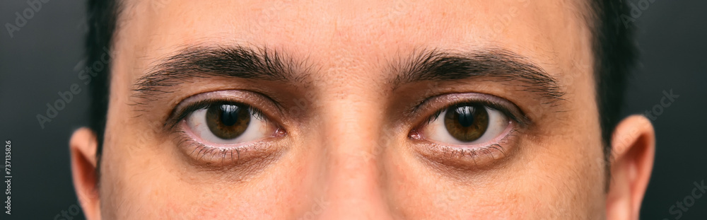 Fototapeta premium Male eyes close up portrait.