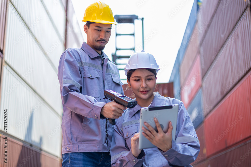 Portrait of an engineer inspecting products using a barcode scanner. Container import and logistics concept Portrait of an engineer inspecting products using a barcode scanner. Container import and logistics concept