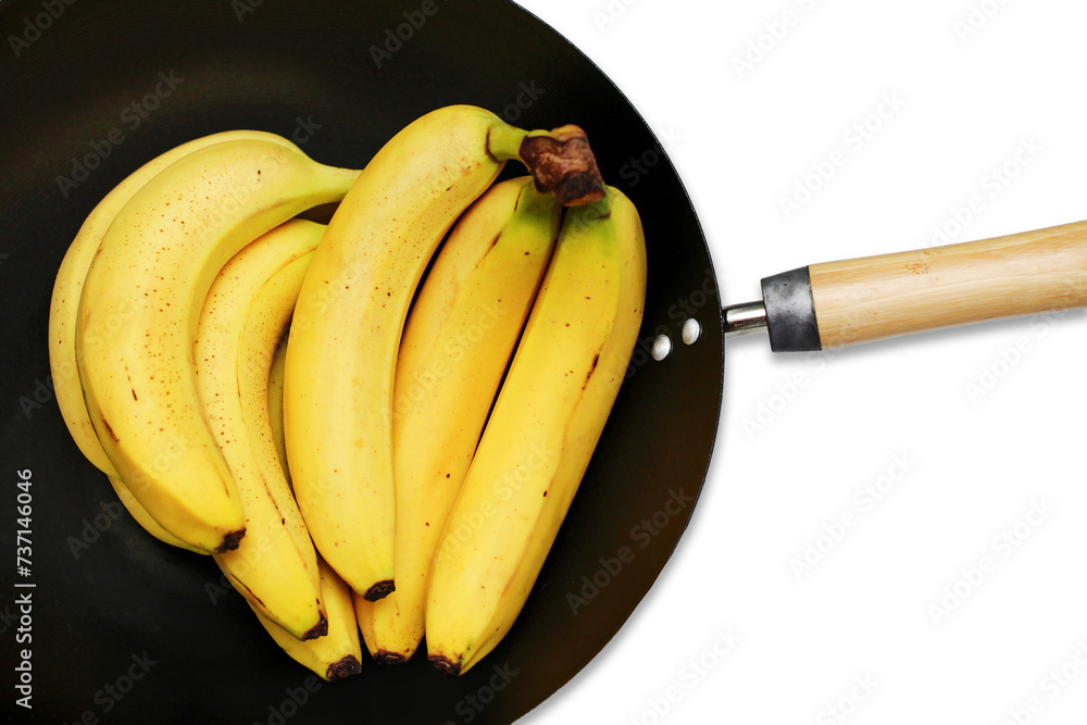 Bananas on frying pan. Bunch of bananas. Conceptual background of