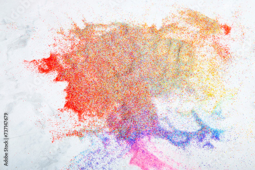 Rainbow powder explosion in a burst of color. Abstract background