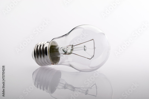 Creative light bulb on a light background