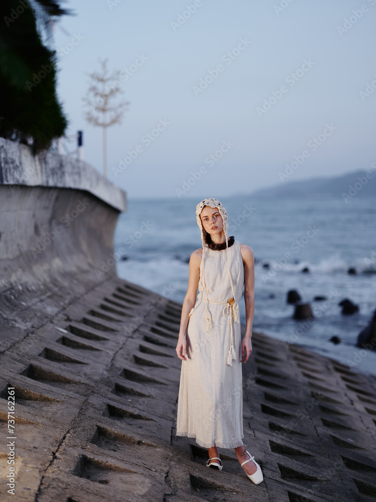 Beauty in White: A Stunning Young Lady Embracing the Summer Vibes on a Beach Vacation Beauty in White: A Stunning Young Lady Embracing the Summer Vibes on a Beach Vacation