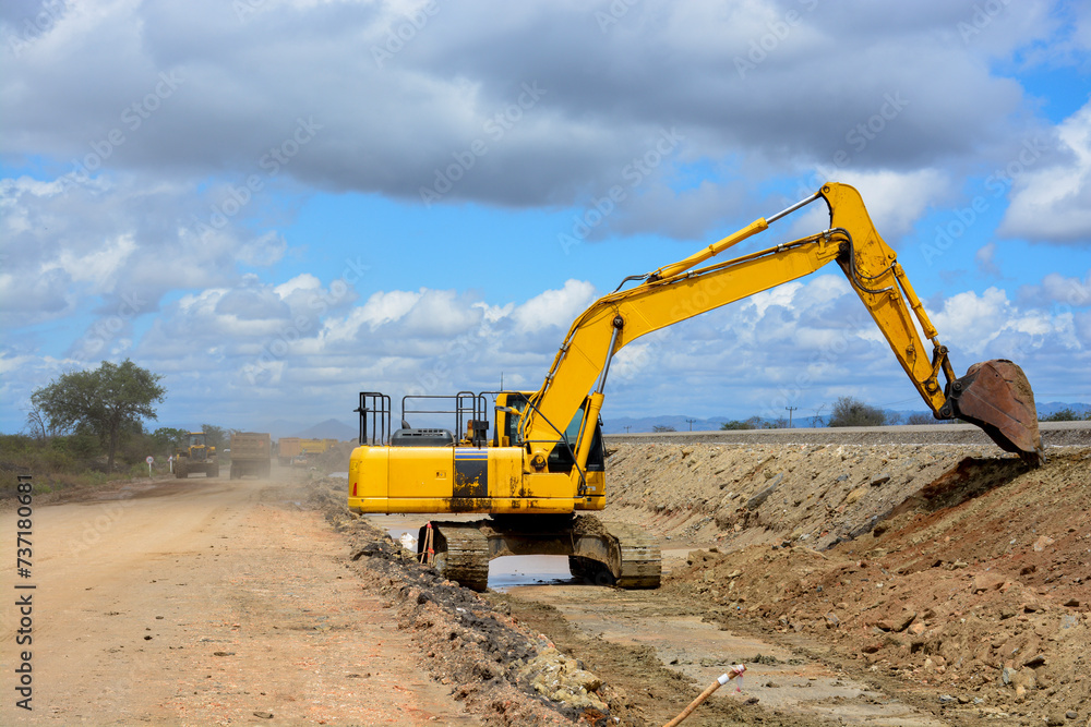 construction machines at works, dozer, roller machine, excavator, crawler rock drill machine, trucks, GPS grader construction machines at works, dozer, roller machine, excavator, crawler rock drill machine, trucks, GPS grader
