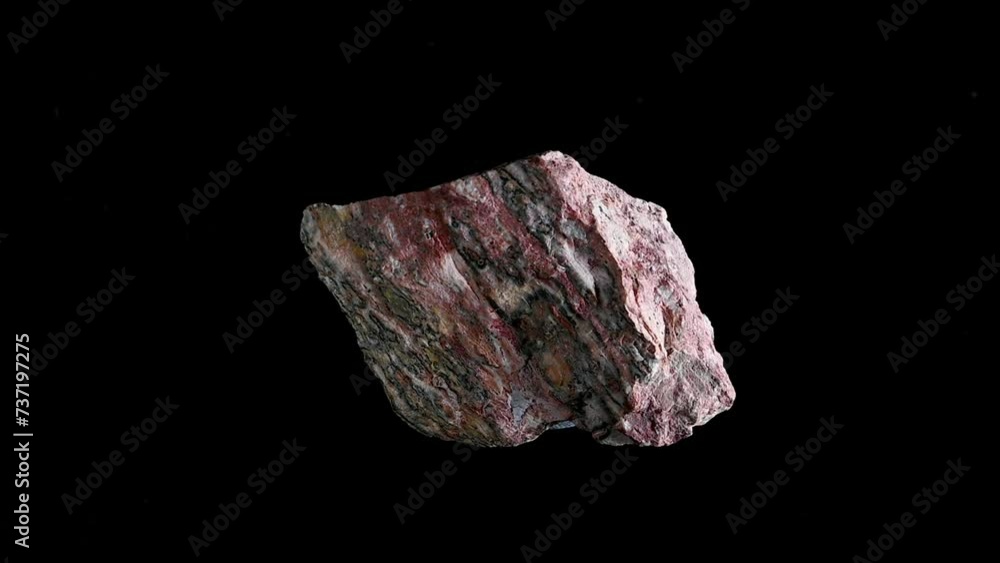 'Bird's Eye' Rhyolite (Mexico) Volcanic equivalent of granite specimen rotating slowly against a black background. 'Bird's Eye' Rhyolite (Mexico) Volcanic equivalent of granite specimen rotating slowly against a black background.