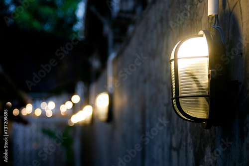 Close up of outdoor lighting lamp at evening