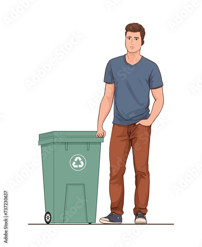 A young guy standing next to a waste container with wheels for easy transportation