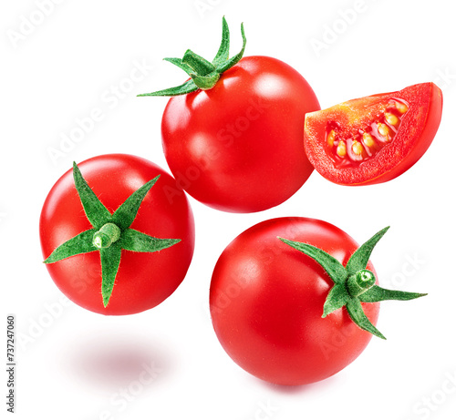 Red cherry tomatoes on branch with water drops isolated on white background. photo