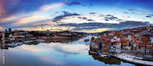 Porto, Portugal, the Douro River, and Dom Luis Bridge during a beautiful sunrise photo